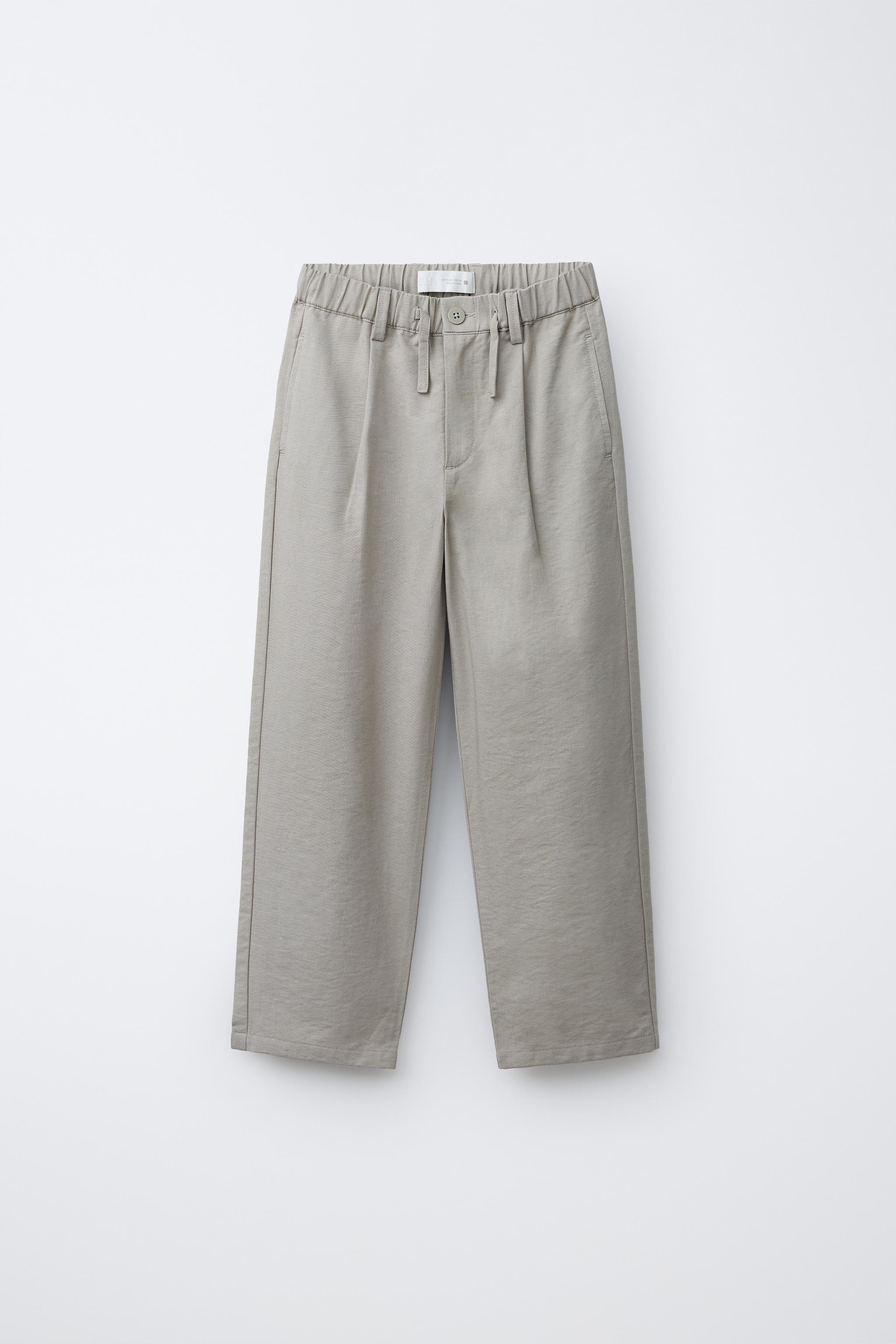 FLOWY PLEATED PANTS